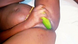 beautiful black babe screams squirting juices unable to take huge cucumber in tight wet pussy