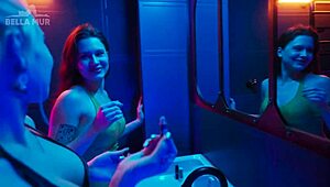 Blonde Bella Mur picks up Sofia Simens in club toilet for wet pussy licking and strapon