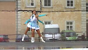 Two nice majorettes showcase cheerleader charm and precision moves