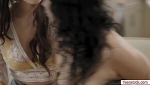 two sexy lesbian babes shift from kitchen licking to shaved pussy munching on the sofa couch