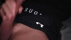 muscular bodybuilder jerks his huge monster cock in tight gym clothes moaning loud on bed during intense solo masturbation session