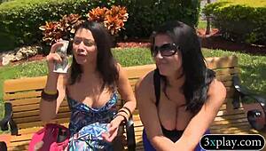 Two Tempting Brunettes Baring Massive Tits in Public for Quick Cash