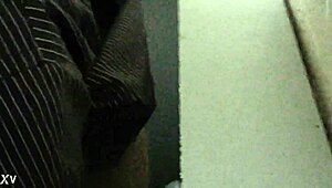 Spycam catches vietnamese guy stroking huge cock in toilet trailer