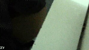 Spycam catches vietnamese guy stroking huge cock in toilet trailer