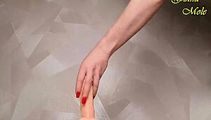 Sexy Milf Rides Massive Dildo in Red Fishnets to Orgasm