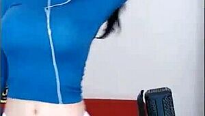 Cute Korean girl dances sexy on stage shaking big tits for crowd