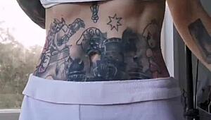 Melody Radford's huge tits and tattooed ass barely fit in micro bikini slut tease