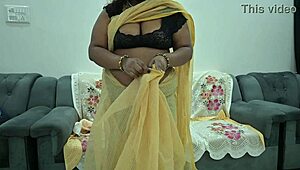 Desi aunt in saree lifts blouse to flash her full tits teasingly