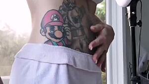 Melody Radford's huge tits and tattooed ass barely fit in micro bikini slut tease