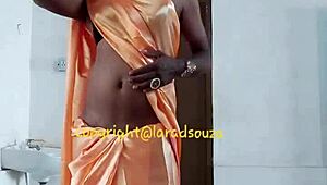 Orange satin saree hides indian crossdresser's slutty anal urges