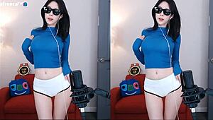 Cute Korean girl dances sexy on stage shaking big tits for crowd