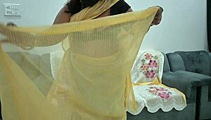 Desi aunt in saree lifts blouse to flash her full tits teasingly