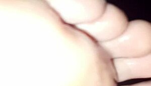 Girlfriend unwinds with boyfriend's teasing licks on her soft toes and feet