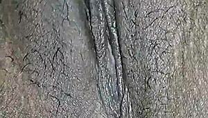 my hairy indian pussy throbs as i finger it deep feeling so horny