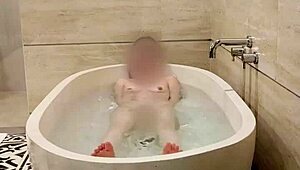 skinny japanese college girl with small tits bathes showing tiny waist and feet