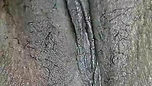 my hairy indian pussy throbs as i finger it deep feeling so horny