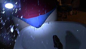 Oops, peeing in blue underpants right over the sink