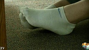 Hidden cam captures dirty sneakers and sweaty socks candid foot fetish tease