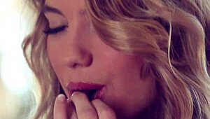 Kenna James Teases in Striptease