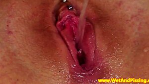 spex babe spreads pierced pussy for pissing toys and deep gaping play