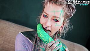 hippie tattooed babe fingers ass and fucks with dildo
