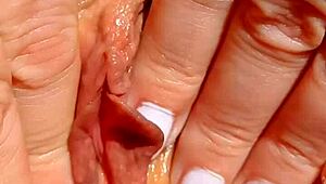 Watch this mature cougar spread shaved pussy for close-up yoni massage fingers deep!