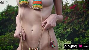 Clara bares her big natural tits stripping naked on the boat