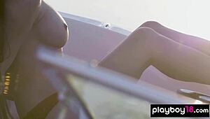 Clara bares her big natural tits stripping naked on the boat