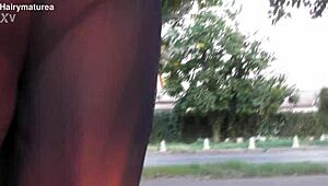 hairy mature flashes beaver through see-thru outfit outdoor