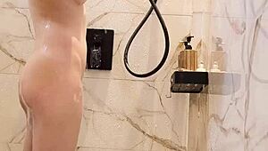 Black hair japanese college girl bathes skinny body in shower