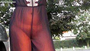 hairy mature flashes beaver through see-thru outfit outdoor