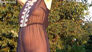 hairy mature flashes beaver through see-thru outfit outdoor