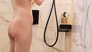 Black hair japanese college girl bathes skinny body in shower