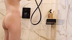 Black hair japanese college girl bathes skinny body in shower