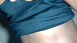 Lady massages her beautiful black tits so seductively