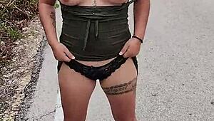 Horny Mexican puta flashes tits and ass on public highway like a tattooed whore.