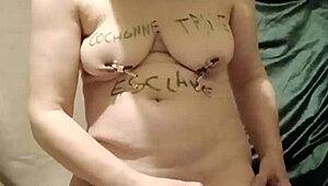 French housewife slave's solo session with clamps candles and harsh words