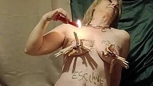 French housewife slave's solo session with clamps candles and harsh words
