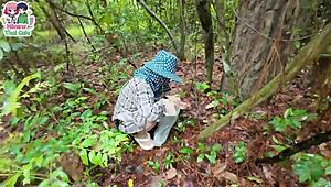 thai teen foraging in forest suddenly flashes her wet pussy up close