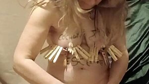 French housewife slave's solo session with clamps candles and harsh words