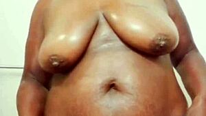 Chubby ebony wife teases wet curves in motel shower preview