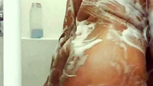 Chubby ebony wife teases wet curves in motel shower preview