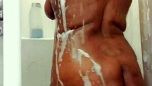 Chubby ebony wife teases wet curves in motel shower preview