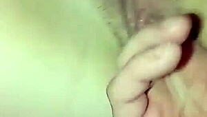Detailed fingering teases wet pussy close-up