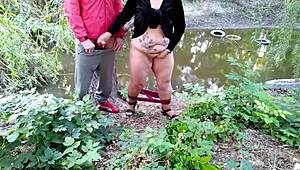 Gorgeous stepmom strokes stepson's cock while fingering her own wet hairy pussy