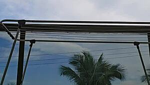 naughty preggo flashes big ass from balcony skirt hike