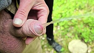 outdoor lover grips small cock while peeing and fingers get wet compilation