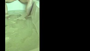 Horny married bride fingers wet pussy to solo bath orgasm with dildo
