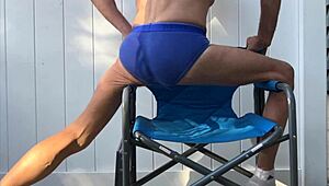 deep pelvic stretching in blue briefs on blue chair late october 2024