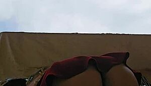 naughty preggo flashes big ass from balcony skirt hike